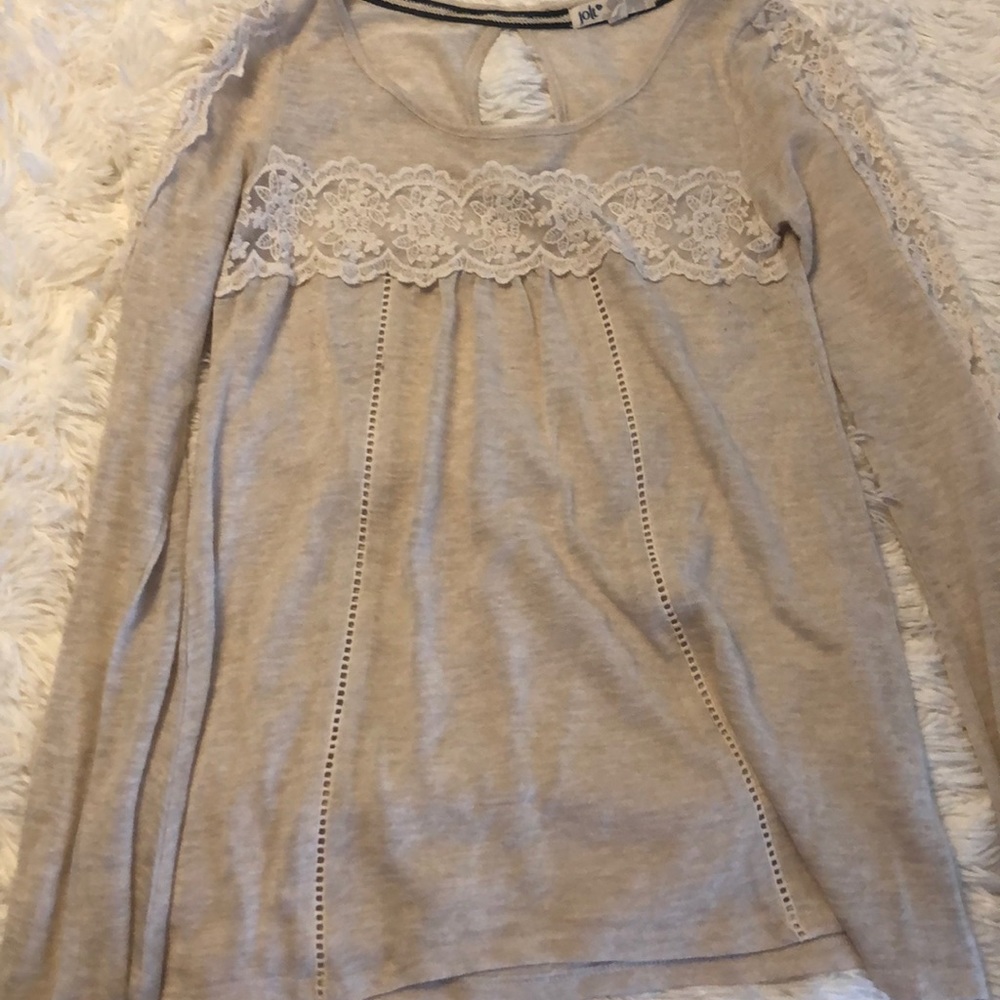 sheer cream colored blouse